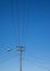 Overhead electicity lines and lampost