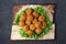 Overhead image of arabic snack falafel in the form of chickpea balls with spices