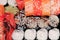 Overhead japanese sushi food. Rolls with tuna, salmon, shrimp, crab and avocado. Top view of assorted sushi, all you can eat menu