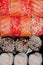 Overhead japanese sushi food. Rolls with tuna, salmon, shrimp, crab and avocado. Top view of assorted sushi, all you can eat menu