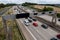 Overhead motorway speed reduction sign warning traffic about a queue ahead