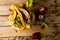 Overhead of organic fruit and vegetable food waste spilling from full kitchen composting bin