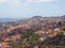 Overhead panoramic view of the city of funchal in madeira with roofs and landmarks of the city visible in front of the sea