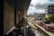 Overhead perspective from a drone reveals the city center, buildings, and railway