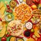 An overhead photo of an assortment of many different Mexican foods on a table