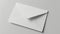 Overhead photo of bright white envelope isolated on the white background