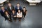 Overhead Portrait Of Business Team Standing In Modern Office