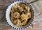 Overhead shot of bowl of oats with banana and pistachios