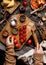 Overhead shot of branch ripe cherry tomatoes on wooden board