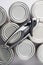 Overhead Shot of Can Opener on Tin Cans