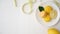 Overhead shot of Colourful Pastel Macarons on white ceramic plate on plank desk