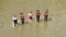 Overhead Shot Of A Gang Of Pirates Walking On A River