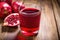 overhead shot of a glass of pomegranate juice