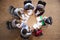 Overhead Shot Of High School Pupils In Group Study Around Tables