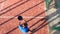 Overhead shot of a padel player marking imaginary lines with racket and hitting