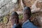 Overhead shot of a pair of hiking shoes on a man\\\'s feet