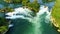 Overhead shot, river among autumn mountain in China, turquoise rapids, zoom out