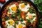 Overhead Shot of Shakshuka in a Skillet with Freshly Chopped Cilantro on Top