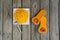 Overhead top view of freshly peeled butternut squash noodles and julienne peeler