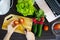 overhead top view of kitchen cook table with vegetables