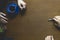 Overhead top view of workers hands on the office table with a copy space