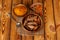 Overhead turmeric roots and powder on wooden table