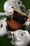 Overhead view of American football amidst sports helmet