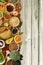 Overhead view of bed of herbs and bowls of beans