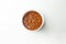 Overhead view of a bowl of chili, isolated on white with room for copy.