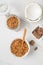 Overhead view of bowl with granola with coconuts and chocolate