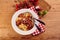 Overhead view of bowl of spaghetti bolognese