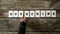 Overhead view of businessman arranging nine white cards with let