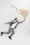 overhead view of businessman holding pile of disposable cups