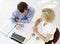 Overhead View Of Businesswoman And Businessman Working At Desk T