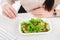 overhead view of businesswoman with take away food at workplace