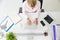 Overhead View Of Businesswoman Working At Computer In Office