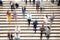 Overhead view of busy crowds of people in motion on the steps to Bethesda Terrace in Central Park, New York City