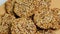 Overhead view of cookies rotating. Cereal cookies close-up. Healthy snack flax seed, pumpkin, sunflower, sesame. Diet