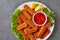 Overhead view of crumbed fish sticks