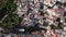 Overhead view of the curved streets and rooftops in Ojen, revealing the intricate layout of this Andalusian town