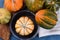 Overhead view of decorative gourds, squash and pumpkins