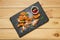 Overhead view of deep fried fruits in breading with caramel and strawberry jam