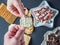 Overhead View Female Hand Grab Christmas Mince Pie Cup Cake From Dark Background