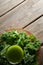 Overhead view of fresh kale juice with leaves