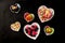 Overhead view of heart shaped bowls with candy