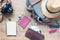 Overhead view of man`s accessories, Traveler items on wooden background.