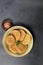 Overhead view of Mathri, an Indian snack made of  whole wheat flour or all purpose flour with fenugreek leaves and Carom seeds