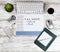 Overhead view of modern technology devices and tax reminder calendar on white wooden boards