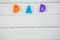 Overhead view of multi colored dad text on white table