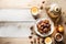 Overhead view on Muslim iftar breaking fast with dried dates, nuts and sweet drinks, with lantern lamp as decoration on